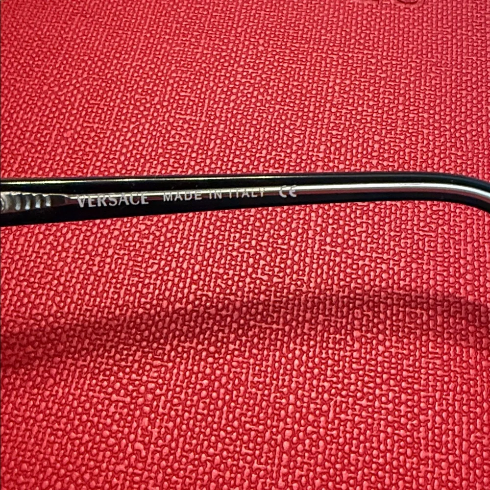 Versace Clear Frame Black Temples glasses with Medusa Detail
